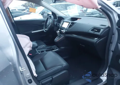 2016 Honda Cr-V Touring z USA, uszkodzony, nr VIN 5J6RM4H91GL125050